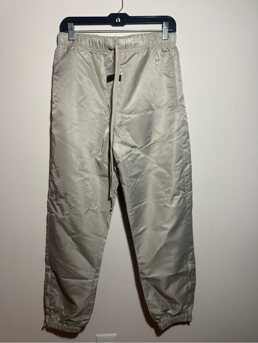 NWT Fear of God Essentials Nylon Trackpant in color Desert Taupe  size Small